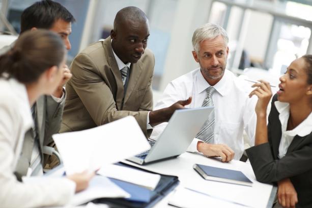 Colleagues talking in a group
