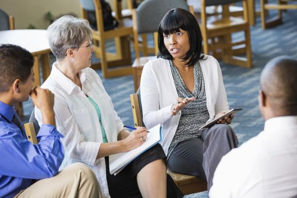Woman talking to a group