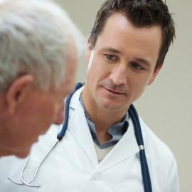 Doctor looking at patient