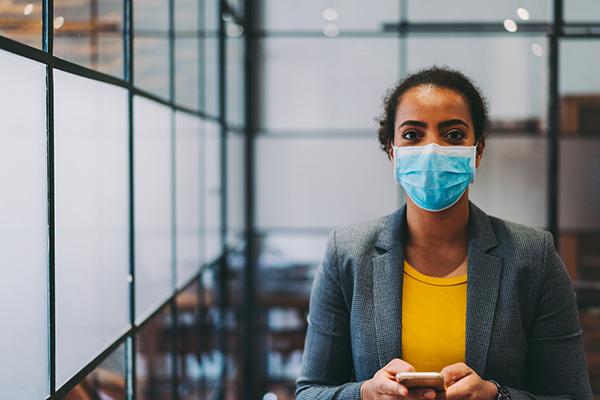 Provider with mask and gold shirt