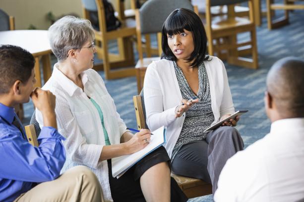 Woman talking to a group